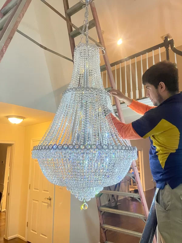 Installation of a crystal chandelier
